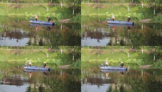 治理水环境环卫工人坐小船湖里清漂宣传片高清在线视频素材下载
