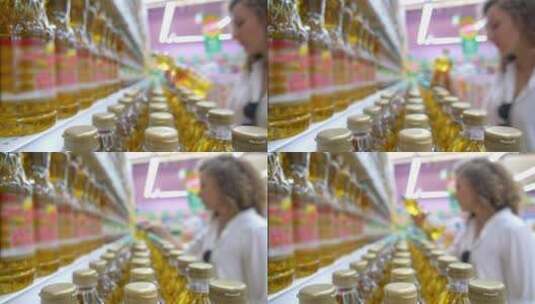 顾客在超市选择葵花籽油高清在线视频素材下载