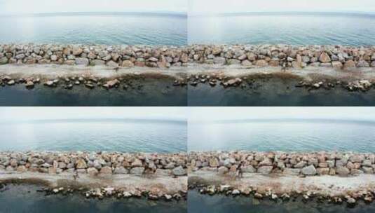 漫步在石质海堤上高清在线视频素材下载