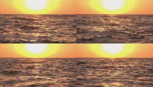 夕阳下的大海海面波浪连连高清在线视频素材下载