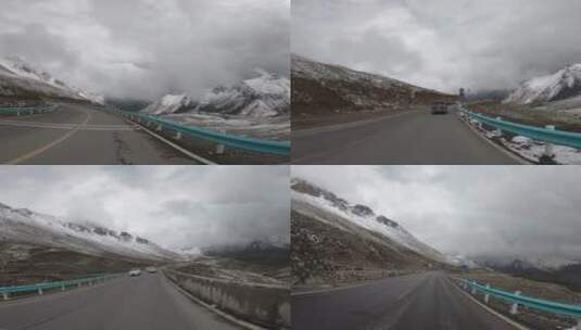 第一视角骑行在新疆独库公路山区雪山高清在线视频素材下载