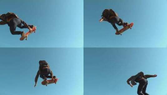 年轻人玩滑板跳跃飞起空中慢动作高清在线视频素材下载