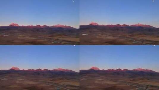 川西塔公草原和雪山日照金山高清在线视频素材下载