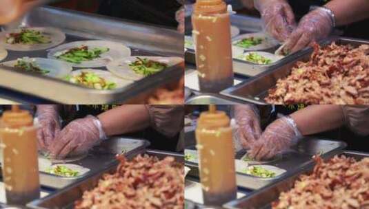 山东淄博八大局市场特色美食小吃卷饼烤鸭高清在线视频素材下载
