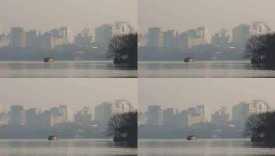 杭州西湖与城市现代高楼同框空镜高清在线视频素材下载