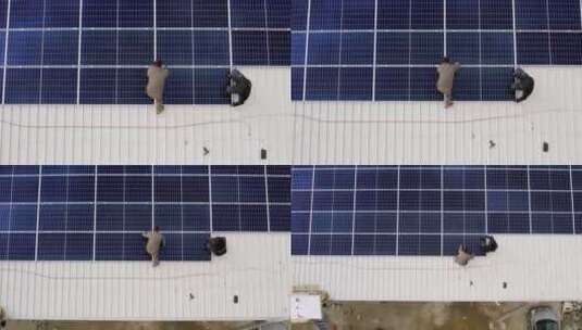 厂房顶屋顶太阳能光伏板安装施工高清在线视频素材下载