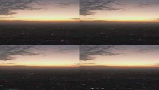 竖版航拍城市夕阳晚霞日落火烧云高清在线视频素材下载