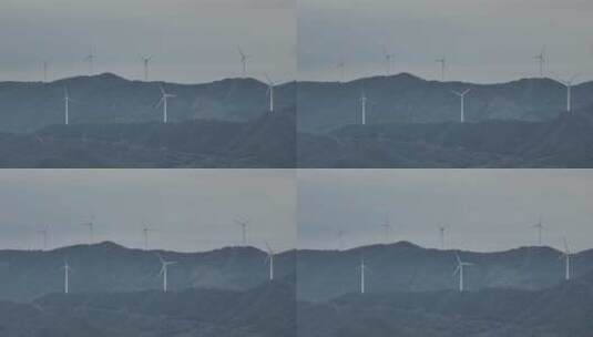 海岛上的风力发电风机高清在线视频素材下载