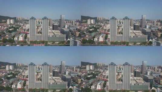 山东烟台城市建设高楼大厦航拍高清在线视频素材下载