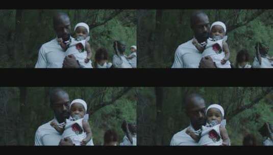 非洲父女穿着白色礼服参加洗礼高清在线视频素材下载