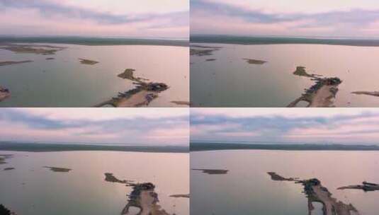 无人机拍摄的渔船停靠在海湾高清在线视频素材下载