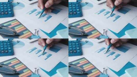 商人在分析表上的财务图表高清在线视频素材下载