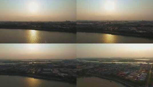 4k东莞市东江河村镇上的金色日落高清在线视频素材下载