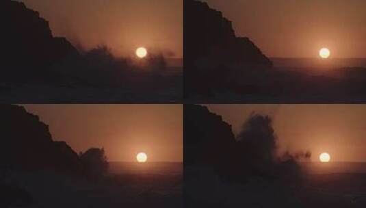 日落时巨浪拍打海岸的岩石高清在线视频素材下载