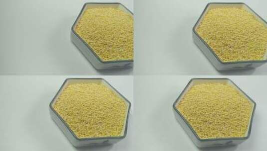 白底五谷杂粮黄金米黄米高清在线视频素材下载