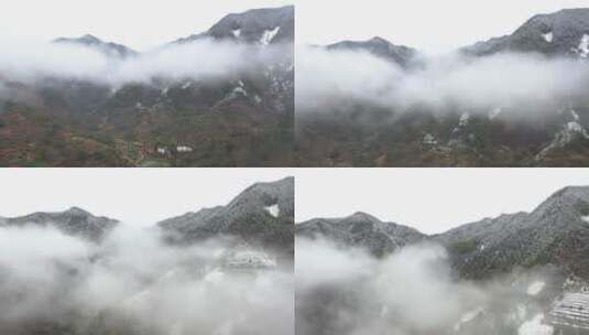 皖南冬天晨雾中的乡村和雪山高清在线视频素材下载