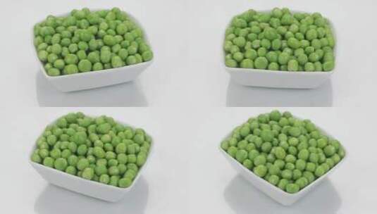一盘新鲜、成熟多汁的绿色豌豆卷高清在线视频素材下载