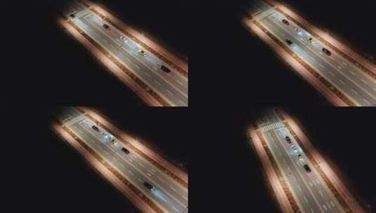 夜晚公路上一排跑车在行驶高清在线视频素材下载