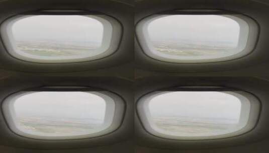飞机舷窗外白云朵朵和美丽地祖国大地高清在线视频素材下载