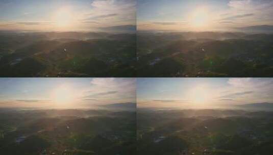 美丽乡里山间日出丁达尔光线航拍高清在线视频素材下载
