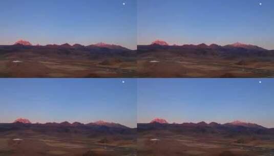 川西塔公草原和雪山日照金山高清在线视频素材下载