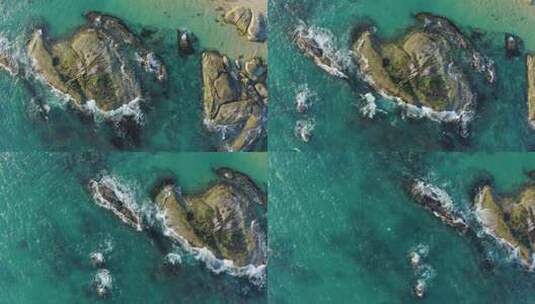 海南岛自然风光碧绿的海浪拍打礁石高清在线视频素材下载