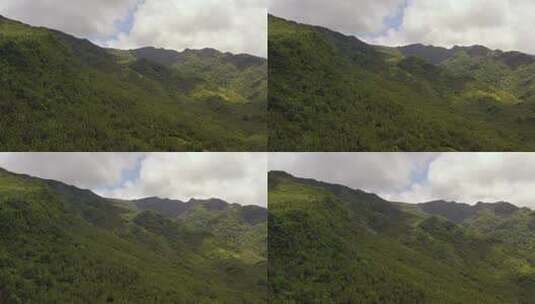 群山覆盖着雨林、树木和蓝天。菲律宾莱特岛。高清在线视频素材下载