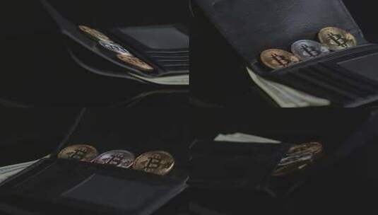 比特币和纸币在黑色钱包里。黑色背景。特写高清在线视频素材下载
