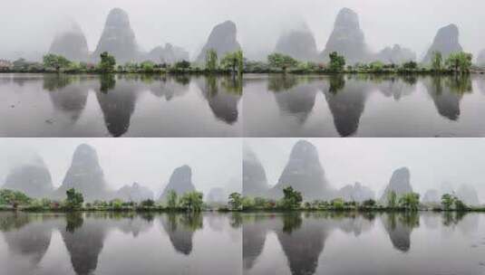 雨天湖景倒映绿树青山的宁静画面高清在线视频素材下载