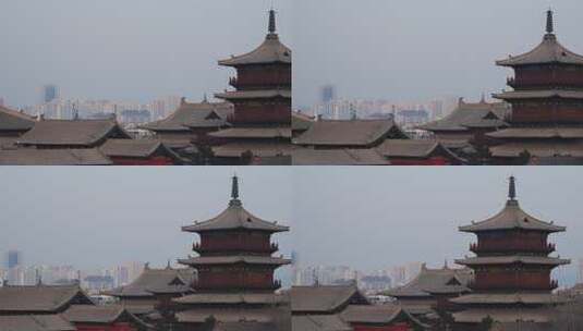 大同华严寺古建筑塔楼与现代建筑相映成趣高清在线视频素材下载