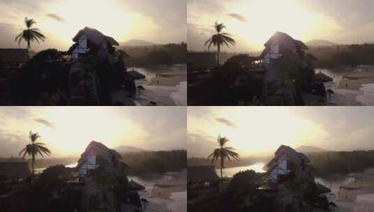 日落下的沙滩和建筑高清在线视频素材下载