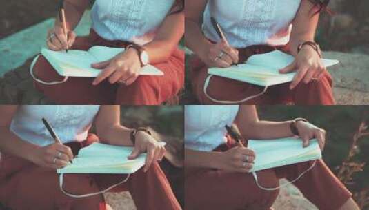 一个女人正在写日记高清在线视频素材下载