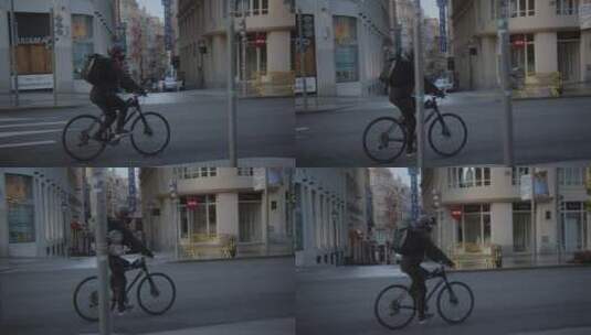 送货员在城市街道骑自行车高清在线视频素材下载