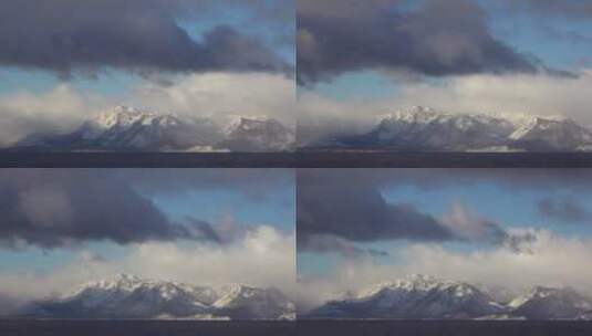 雪山上移动的云层高清在线视频素材下载