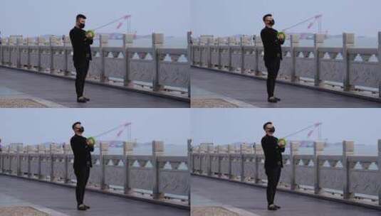 栈桥放风筝的男子60帧高清在线视频素材下载