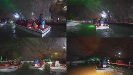 洞穴中乘船游览的游客高清在线视频素材下载