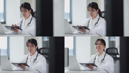 年轻女医生在办公室使用笔记本和平板工作高清在线视频素材下载