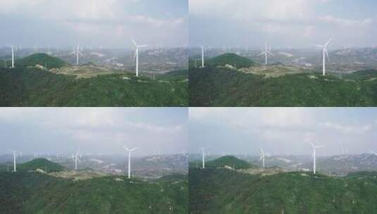 航拍乡村农田涡轮风力发电机高清在线视频素材下载
