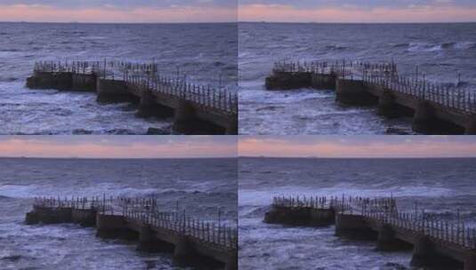 山东威海金海湾栈桥的冬季大浪高清在线视频素材下载