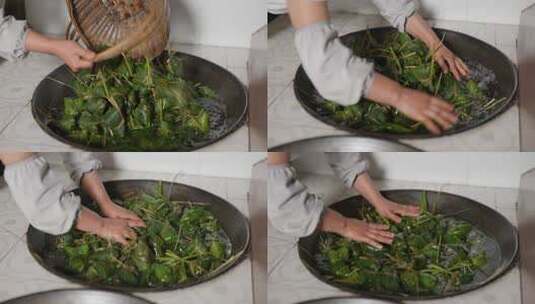 端午把粽子放铁锅里煮高清在线视频素材下载