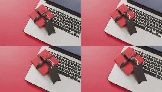 笔记本电脑上的红色礼品盒高清在线视频素材下载