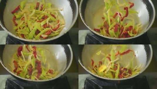在锅里炒青椒和红辣椒高清在线视频素材下载
