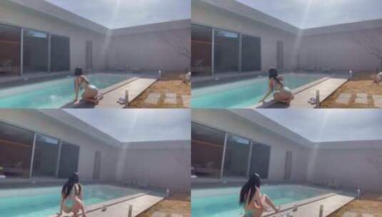 比基尼美女在泳池游泳玩水阳光照射美女高清在线视频素材下载