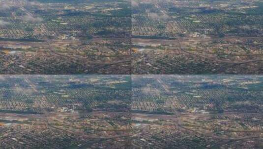 飞机上视角拍摄地面城市高清在线视频素材下载