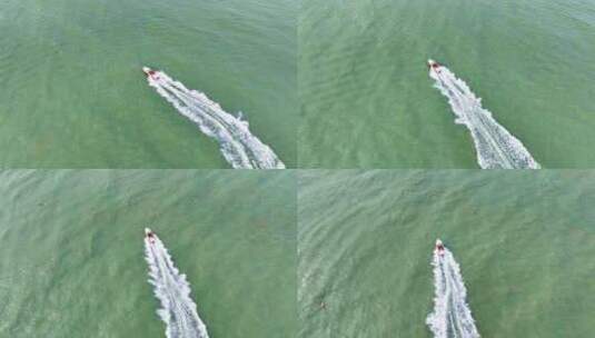 航拍快艇摩托艇在浅水海域海面滑行高清在线视频素材下载