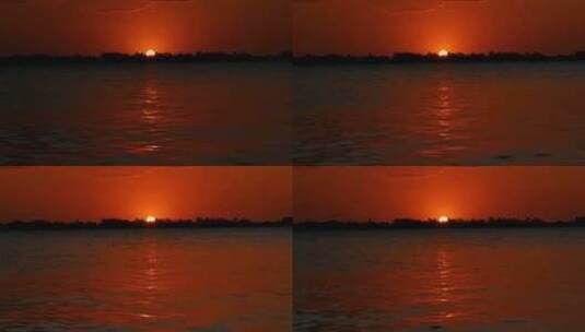 湖面夕阳红落日波光粼粼的水面黄昏高清在线视频素材下载