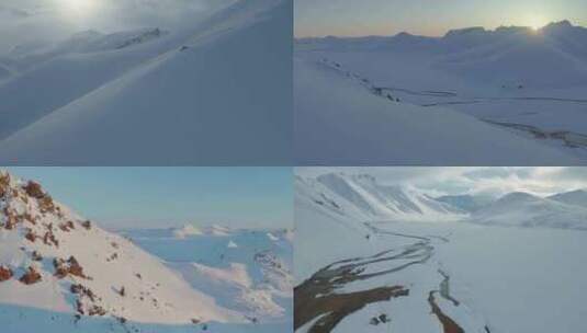 航拍万里冰封大雪山云雾缭绕雪景旅游高清在线视频素材下载