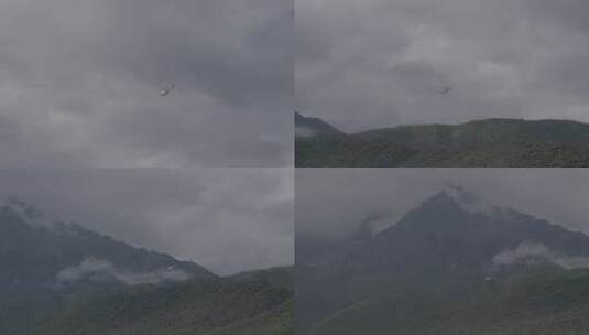 拍摄飞行在雪山的直升飞机高清在线视频素材下载