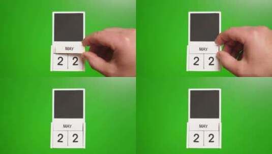 05.绿色背景上日期为5月22日的日历。高清在线视频素材下载