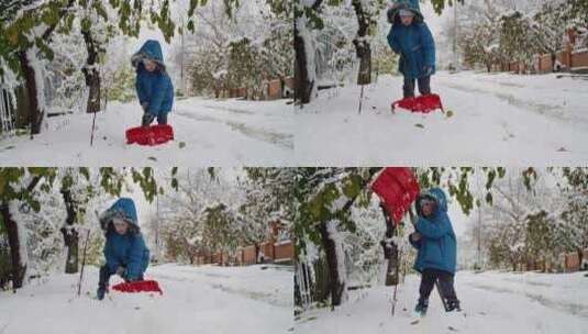 在寒冷的暴雪娱乐中，一个孩子铲雪的努力点高清在线视频素材下载